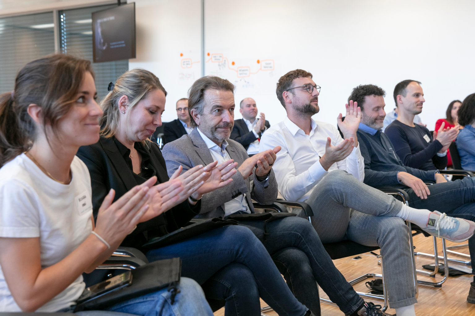 Workshop participants engaged and applauding